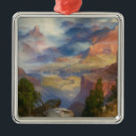 Ornamento De Metal Grand Canyon in Mist (por Thomas Moran)<br><div class="desc">Esta design apresenta uma pintura do artista americano Thomas Moran (1837-1926). Mostra uma visão do Grand Canyon no estado de Arizona dos EUA. O canyon,  que foi esculpido na paisagem pelo Rio Colorado,  está envolto em neblina e neblina. Há algumas árvores crescendo em alguns picos rochosos no primeiro plano.</div>