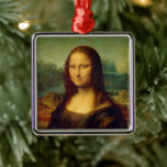 Ornamento De Metal Mona Lisa | Leonardo da Vinci<br><div class="desc">Mona Lisa (1503-1506) apresentada pelo artista Renascentista italiano Leonardo da Vinci. O trabalho original é óleo no painel de madeira poplar. Pensa-se que esta famosa pintura seja um retrato de Lisa Gherardini, e foi aclamada como "a mais conhecida, a mais visitada, a mais escrita, a mais cantada, a mais parodiada...</div>