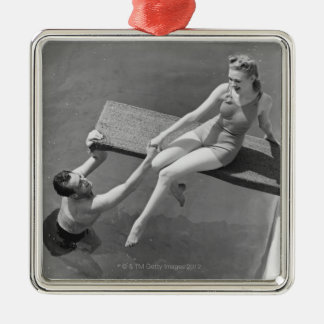 Ornamento De Metal Mulher no conselho de mergulho
