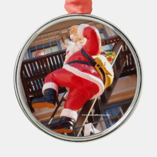 Ornamento De Metal Papai Noel no escape de fogo