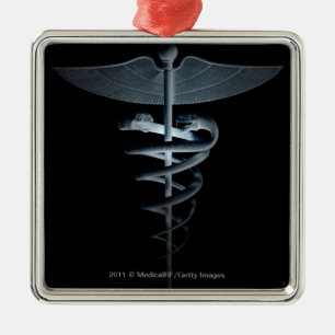 Ornamento De Metal Projector em um caduceus médico