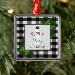 Ornamento De Metal Snowman Buffalo Plaid Ceramic Ornament<br><div class="desc">Decorate your Christmas tree this holiday season with a Snowman Buffalo Plaid Ornament.  Ornament design features a box adorned with pine branches and charming snowman against a black and white buffalo plaid background.  Additional gift and holiday items available with this design as well.</div>