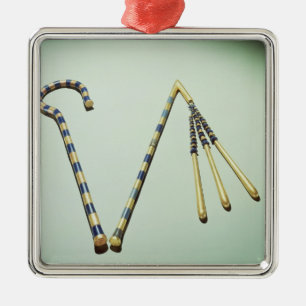 Ornamento De Metal Trapaceiro e flail, do túmulo de Tutankhamun