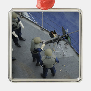 Ornamento De Metal Um marinheiro dos E.U. ateia fogo 50 a um calibre