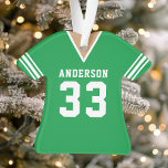 Ornamento Futebol Verde Personalizado Jersey<br><div class="desc">Celebre sua estrela de futebol com esta personalizada decoração de camisa verde de futebol. Perfeito para comemorar uma estação especial,  jogador ou equipe. Personalize-o com um nome e número para criar uma manutenção exclusiva.</div>