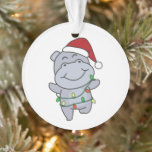Ornamento Hippo Christmas Winter Animais Hippos<br><div class="desc">O hipopótamo no Natal com luzes de fadas. Animais engraçados com presentes e neve nas férias. Uma doce saudação de Natal. Hippos são animais bonitos e perfeitos para o Natal.</div>