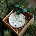 Ornamento Nome personalizado do bebê no primeiro Natal<br><div class="desc">Um enfeite especial para comemorar o primeiro Natal do bebê. Design apresenta um simples design com "Primeiro Natal do Bebê" exibido em um roteiro elegante e emparelhamento de texto serif com uma foto exibida em segundo plano com uma cobertura branca transparente. Personalize com o nome do bebê e o ano....</div>