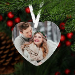 Ornamento Primeiro Natal como Foto de Casamento de Sr. e Sra<br><div class="desc">O ornamento de manutenção de férias em forma de coração para um casal recém-casado mostra uma foto de casamento na frente com a frase "Primeiro Natal como Sr. e Sra." e sotaque cardíaco no verso. Personalize a redação do monograma personalizado moderno com nomes próprios e a data do casamento. As...</div>