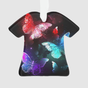 Ornamento Três Borboletas brilhantes sobre o fundo noturno