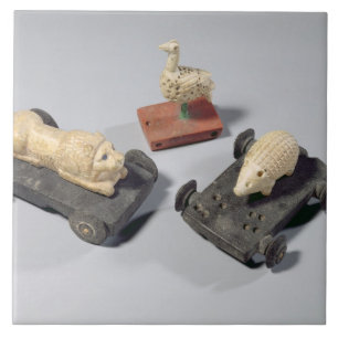 Os brinquedos das crianças: um ouriço, um leão e