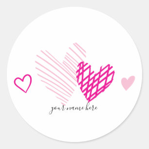 Os corações cor-de-rosa personalizaram etiquetas