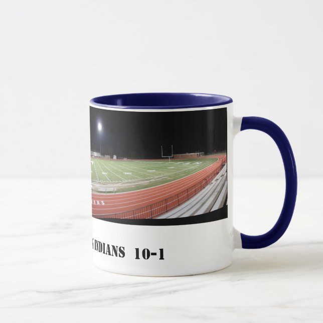 Os indianos do MHS dirigem a caneca 2009 do campo (Direita)
