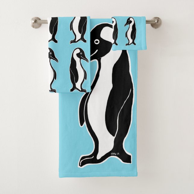 Os pinguins modelam o grupo azul de toalha (Insitu)