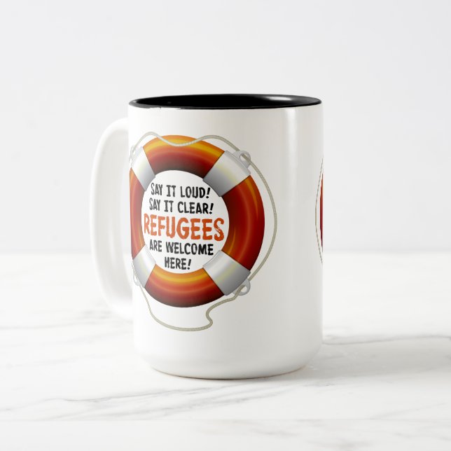 Os refugiados dão boas-vindas à grande caneca (Frente Esquerda)