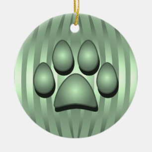 Osso de cão e enfeites de natal verdes da pata