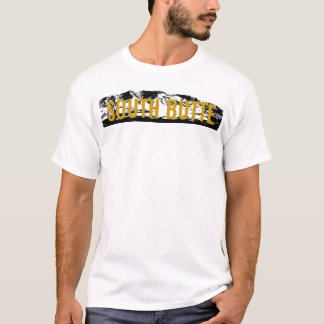 Ouro sul do montículo na camisa preta de T