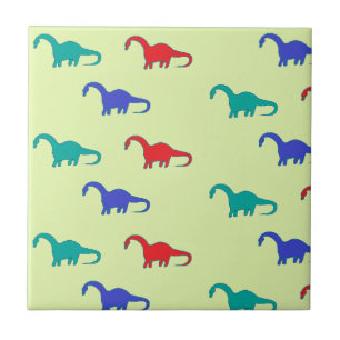 Padrão colorido de dinossauros em verde