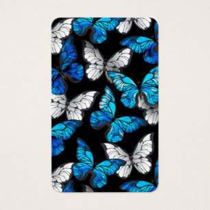 Padrão contínuo escuro com borboletas azuis Morpho