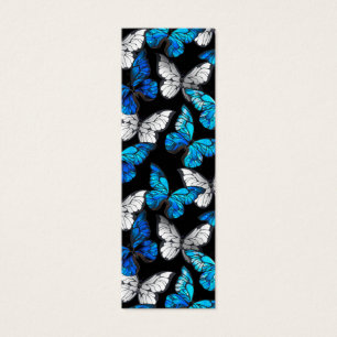 Padrão contínuo escuro com borboletas azuis Morpho