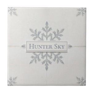 Padrão de floco de neve azul e branco com nome per