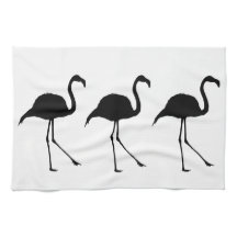 Três flamingos