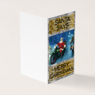 Papais noeis de um cartão de Natal de motocicleta