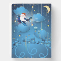 Papais noeis estão chegando a caixa de madeira