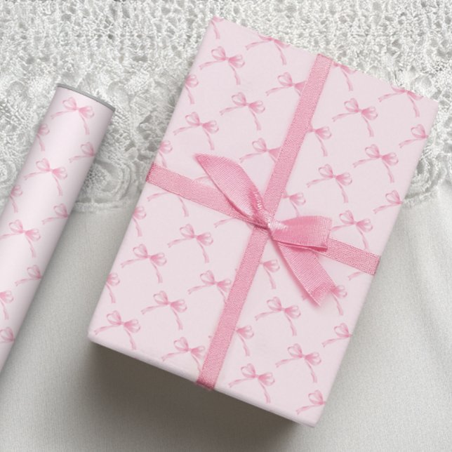 Papel de embrulho com laço rosa (Criador carregado)