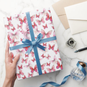 Papel de embrulho com padrão de borboletas vermelh