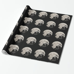 Papel de embrulho lua atrás das folhas pretas