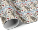 Papel De Presente Alaskan Malamute Dog Winter Wonderland Christmas<br><div class="desc">seu design festivo captura o espírito alegre da época de férias, apresentando um adorável filhote vestindo um chapéu de Papai Noel. O gato está aninhado numa terra maravilhosa de inverno, completo com um boneco de neve, uma árvore de Natal decorada, e presentes lindamente envoltos. Os flocos de neve caem suavemente,...</div>