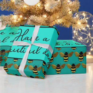 PAPEL DE PRESENTE BELA ABELHA PRETA DOURADA TEXTO AQUA VERDE