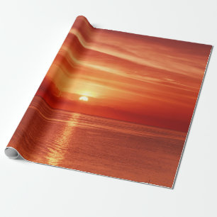 Papel De Presente Belo e colorido nascer do sol no mar com dramas