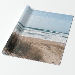 PAPEL DE PRESENTE CÁPSULA MARINHA PERTO DO MAR SOB O CÉU AZUL