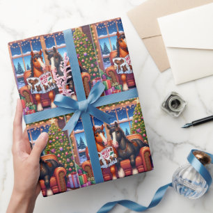 Papel De Presente Cavalos De Natal No Sofá Com Novo Livro De Desejo