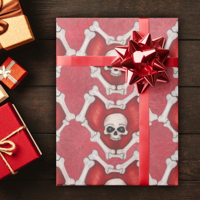 Papel De Presente Corações Vermelhos Descobertos em Ossos com Crânio (Deep red hearts outlined in bones with skull  inside on red starburst patterned roll wrapping paper.)