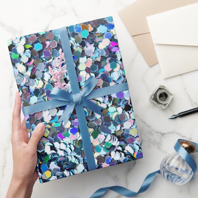 Papel De Presente Estilo de Falha (A vibrant roll of wrapping paper covered in colorful shimmering confetti patterns. )
