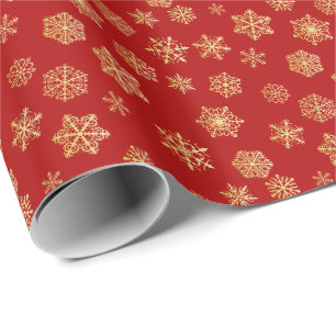 Papel De Presente Flocos de neve de ouro sobre fundo vermelho