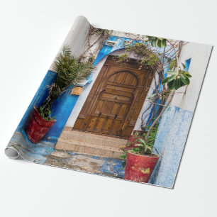 PAPEL DE PRESENTE PLANTA DE CABEÇA VERDE PERTO DA PAREDE