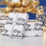 Papel De Presente Preto em White Merry Christmas Calliographic<br><div class="desc">Este elegante e moderno papel de embrulho apresenta as palavras "Feliz Natal" em um roteiro de caligrafia de pincel preto sobre fundo branco.</div>