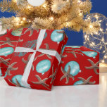Papel De Presente Sea Life Tropical Padrão Red Christmas<br><div class="desc">Papel de embrulho de presente de Natal tropical com estrelas-do-mar,  cavalos-do-mar e ornamentos de bola azul-aqua impressos em design de cor vermelha profunda de férias.</div>