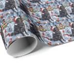 Papel De Presente Shepherd Dog Winter Wonderland Christmas<br><div class="desc">seu design festivo captura o espírito alegre da época de férias, apresentando um adorável filhote vestindo um chapéu de Papai Noel. O cachorro está aninhado numa terra maravilhosa de inverno, completo com um boneco de neve, uma árvore de Natal decorada, e presentes lindamente envoltos. Os flocos de neve caem suavemente,...</div>