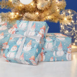 Papel De Presente Snowmen Snowflakes Blue Modern Christmas<br><div class="desc">Adicione um toque de charme gelado aos seus presentes de Natal com este delicioso papel de embrulho de Natal azul-gelo. O fundo azul-sereno de gelo cria uma terra maravilhosa, realçando perfeitamente o padrão alegre de homens de neve vestidos com chapéus e cachecóis aconchegantes. Seus designs brincalhões trazem um senso de...</div>