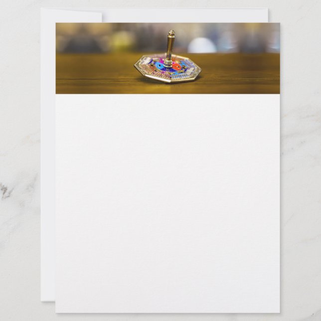 Papel Timbrado Presente SlipperyJoe Hanukkah dreidel base octogon (Frente)