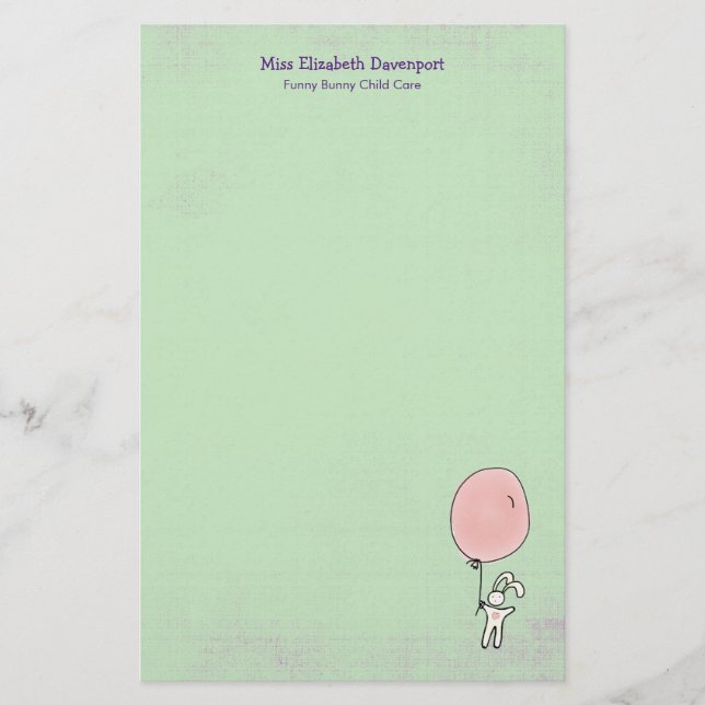 Papelaria Coelhinho bonito segurando um balão (Frente)