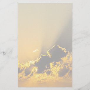 Papelaria Por do sol dourado que ilumina uma nuvem