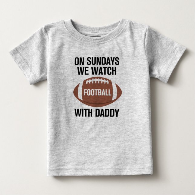 Para Bebê Aos domingos assistimos futebol com camiseta Pai (Frente)