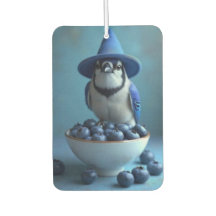 pássaro azul e uma tigela de mirtilos