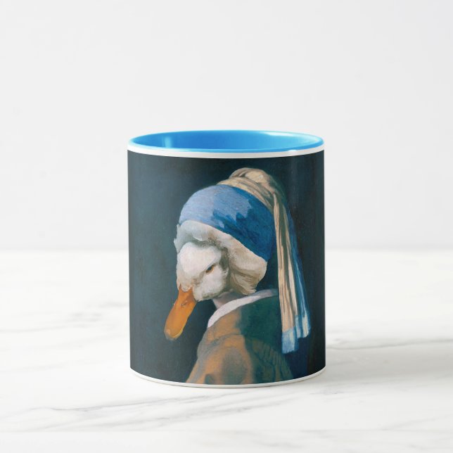 Pato com uma pérola a tocar caneca (Centro)