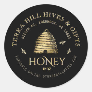 Pele com Abelhas na Etiqueta de Mel Preta e Dourad